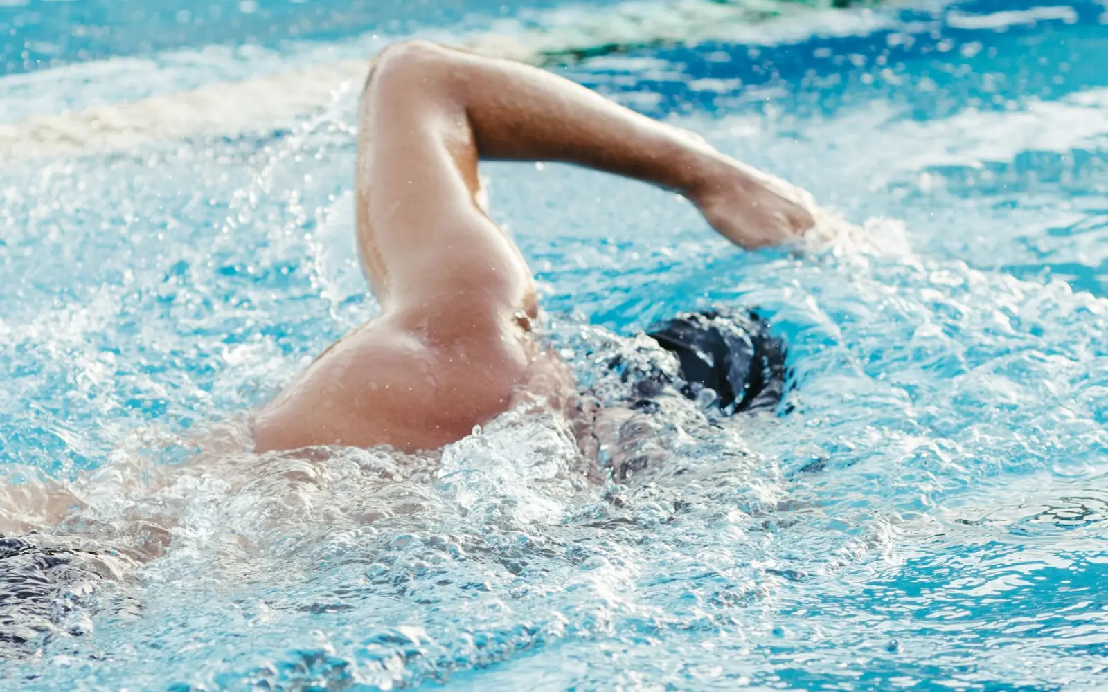 Swim Training Techniques and Biomechanics: Mastering the Water for a Faster Triathlon Split